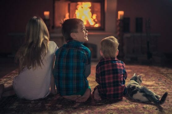 Children By The Fireplace