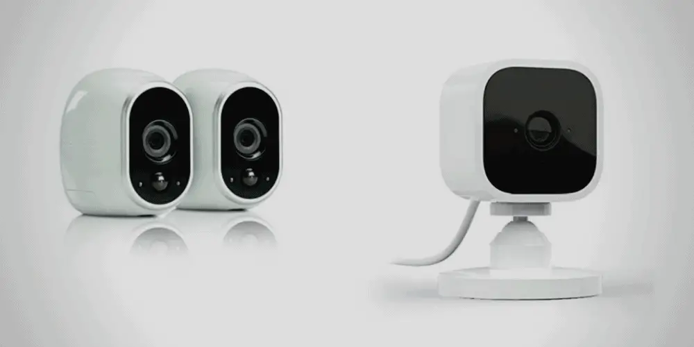 an Arlo Home Security Camera side by side with Blink Home Security Camera