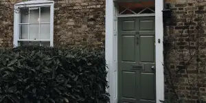 an olive green color door