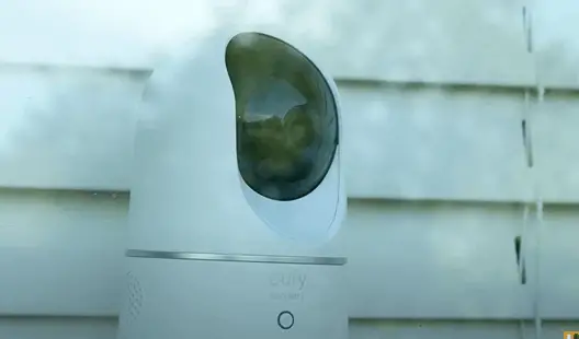 security camera behind glass