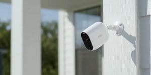 arlo security camera mounted at the outdoor wall
