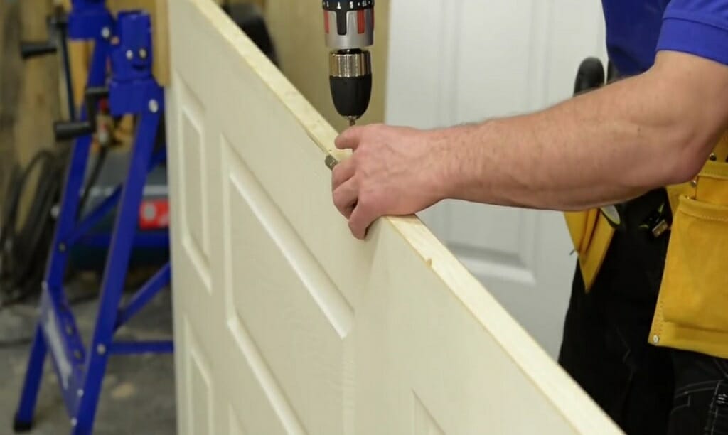 drilling the holes for hinges